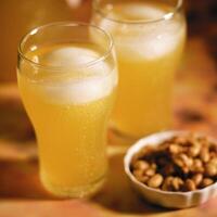 Lemonade in a glass close view background photo