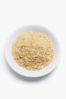 Unprocessed Wheat Bran in a Bowl, Close View Background photo