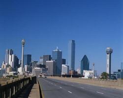 Modern Urban Skyline with Skyscrapers and Clear Blue Sky by Daylight photo