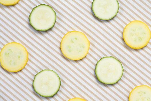 Slices of Courgette on a White Background photo
