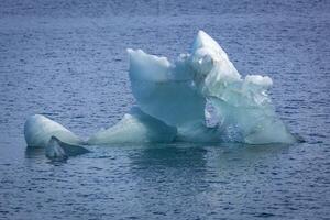Cruising at perfect weather in the Arctic with an expedition between Nordaustlandet and Spitsbergen on Svalbard, Norway photo
