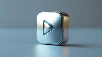 Metallic play button shining on reflective surface symbolizing online streaming photo