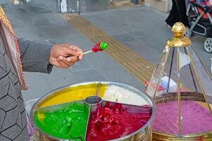 Ottoman macun sugar. Traditional Turkish dessert. Street food. photo