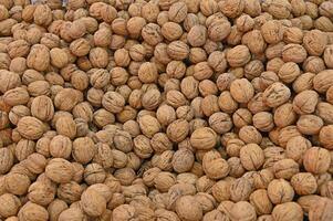 Shelled walnuts on the market stall. photo