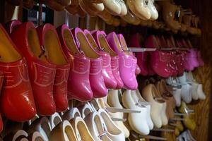 Shoes in a workshop making traditional wooden shoes in the Netherlands. photo