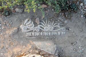A historical artefact on the soil surface in the ancient city of Knidos. photo