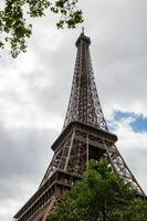 Close-up view of the Eiffel Tower. photo