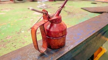 Vintage Oil Can in Workshop photo