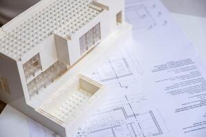 Architectural Model With Building Plans And Design photo