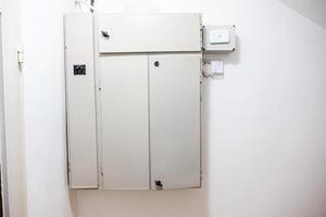 Close-Up of Electrical Meter With Digital Display and Switches photo