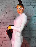 Portrait of a model with bright creative make up photo