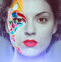 Beautiful young model with bright make up photo