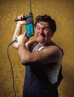 The builder holds the professional puncher-hammer photo