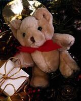 Charming Christmas Ornament Featuring a Happy Plush Teddy Bear and a Fawn Toy photo