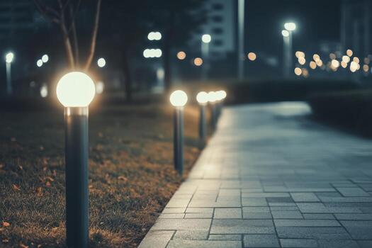 Soft lights illuminate urban stairs during evening hours in a serene setting photo