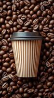 Freshly brewed coffee resting among roasted coffee beans on a textured surface photo