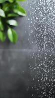 Modern shower head with sleek design and flowing water in contemporary bathroom setting photo