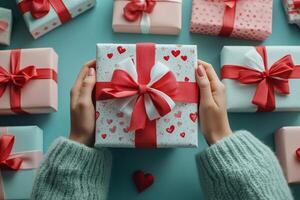 Colorful wrapped gifts with heart patterns on a blue background for a celebration photo