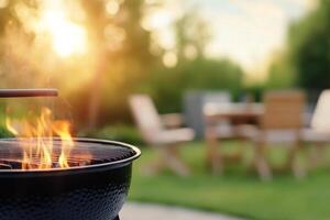 Cooking over an open flame by the lakeside on a sunny afternoon in summer photo