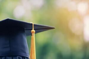 Graduation cap with golden tassel on textured background during celebration preparations photo