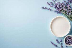 Fresh lavender arrangement with bowls on light blue background for creative projects photo