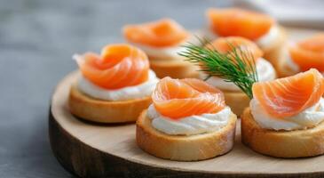 Delicious salmon canaps with cream cheese on toasted bread at a festive gathering photo