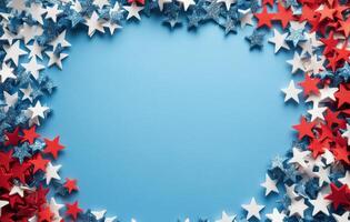 Colorful red, white, and blue star decorations arranged on a blue background for festive occasions photo