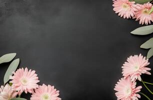 Elegant floral arrangement with pink blooms and greenery on a dark background photo