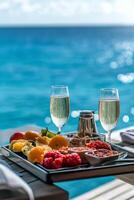 Luxurious brunch by the pool featuring fresh fruits and sparkling beverages photo