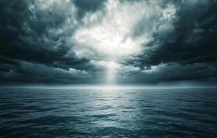 Dark storm clouds over turbulent ocean waters create a dramatic seascape photo