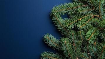 Fresh green pine branches adorned with warm, glowing lights during the holiday season photo
