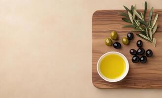 Fresh olives and olive oil arranged on a wooden board for healthy cooking ideas photo