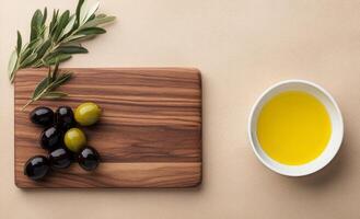 Fresh olives and olive oil arranged on a wooden board for healthy cooking ideas photo