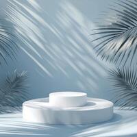 Modern display platform surrounded by tropical leaves and soft shadows in a light blue setting photo