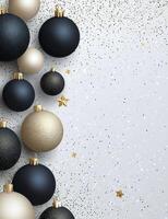 Decorative black and gold Christmas ornaments on a white background with glitter photo