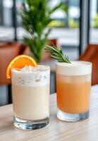 Refreshing cocktails with citrus and herbal garnish served in a stylish bar setting photo