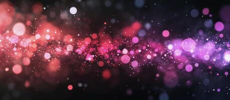 Colorful abstract background with glowing particles in shades of pink and purple during night photo