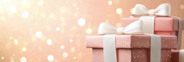 Pink gift boxes decorated with ribbons against a soft bokeh background for celebration photo