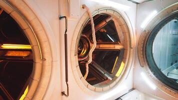 Interior view of a futuristic space station module featuring circular portals video