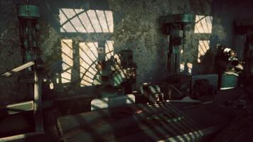 Light and shadow play in an abandoned workshop filled with old tools video