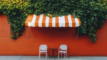 Charming outdoor cafe setting with striped awning and greenery in a vibrant urban location photo