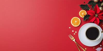 Festive holiday table setting with a red background, coffee, and seasonal decorations photo