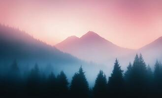 Misty mountain landscape at dawn with trees and soft pink sky in the morning light photo
