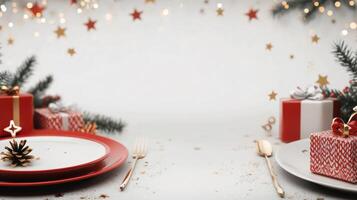 Decorative Christmas dining table with red plates and festive ornaments for holiday gathering photo