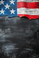 American flag with frayed edges draped against a dark textured background photo