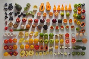 A Colorful Array of Fruits and Vegetables on a White Background photo