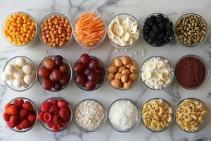 An Array of Ingredients in Glass Bowls on a Marble Surface photo