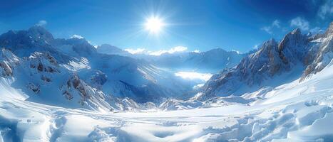Sunlit Snow-Covered Mountain Range with a Clear Blue Sky photo