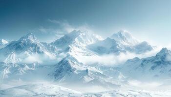 Snowy Mountain Range with Hazy Clouds photo
