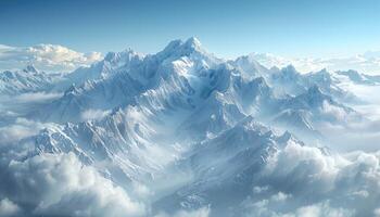 Snow-Covered Mountain Range Emerging from Clouds photo